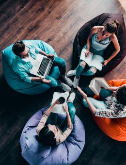 people sitting by a table 