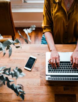 Birds-eye view of a person working at a computer