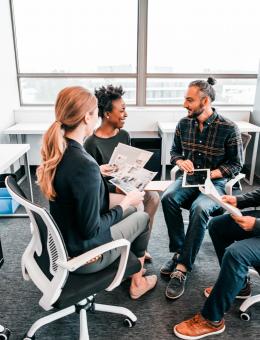 Colleagues working in a meeting room 