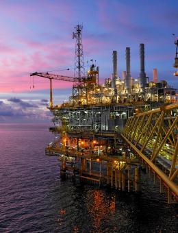 Oil rig with a beautiful sunset