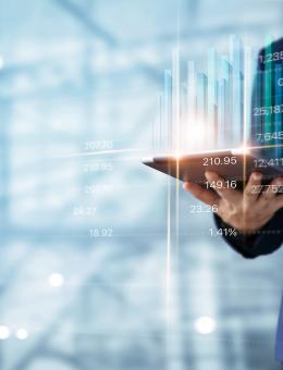 Man looking at data with a tablet 