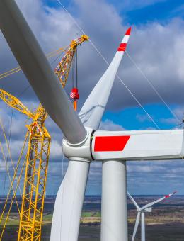 onshore windmill construction and repowering with a crane, as part of large wind farm